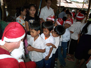 children of Aziza Schoolhouse visit Santa