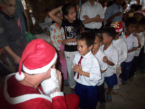 children of Aziza Schoolhouse visit Santa